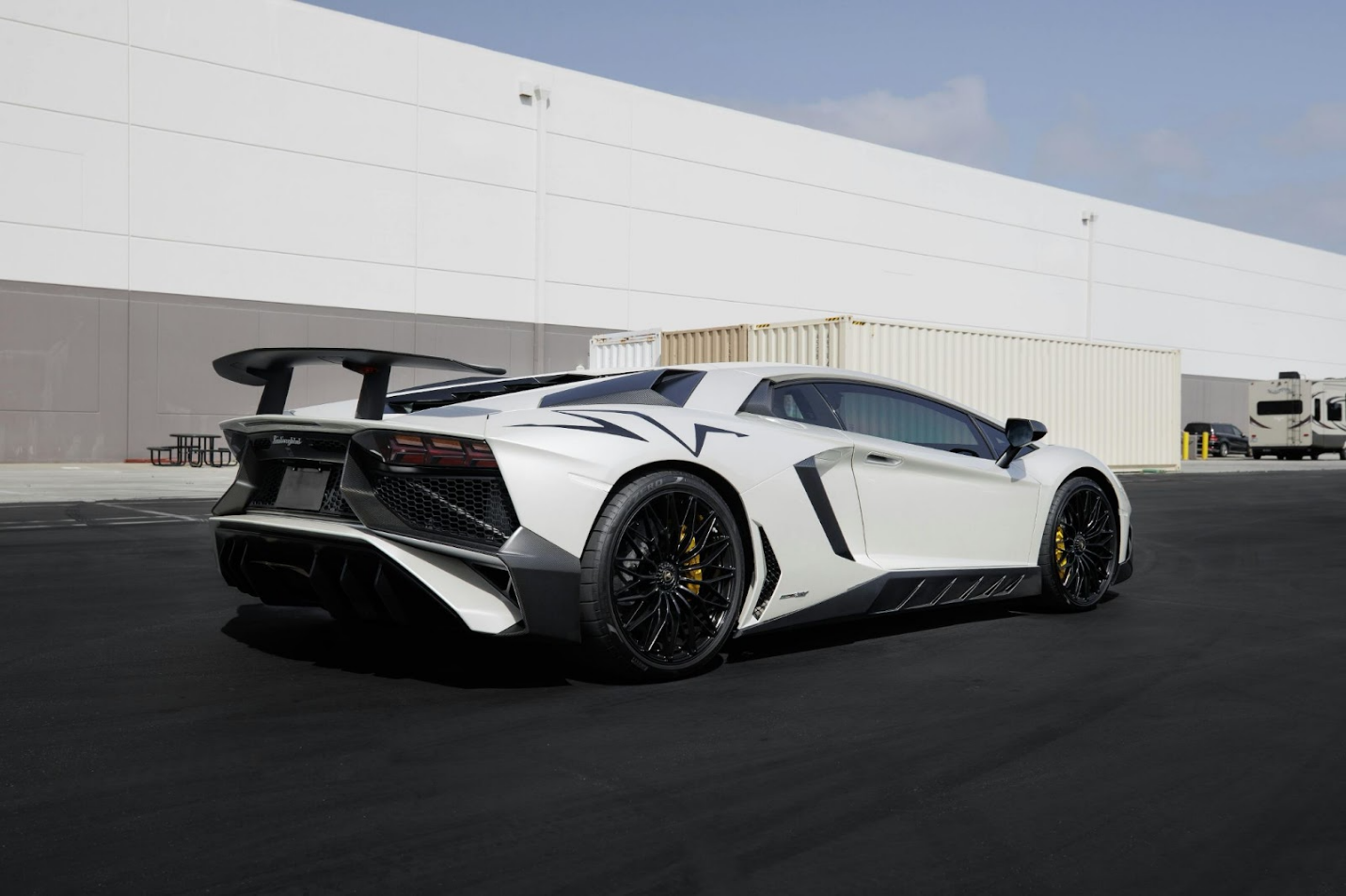 white lamborghini on the road